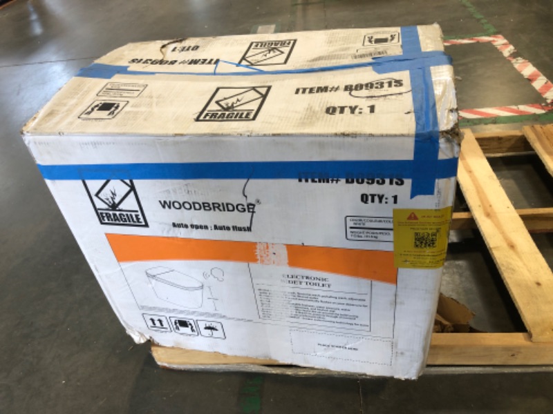 Photo 1 of ***HEAVY ITEM***WOODBRIDGE B0931S Voice Control Smart Bidet Toilet with 1.28 GPF Dual Flush Auto Open & Close,Foot Sensor,1000 Gram Map Flushing Score,Movement Drying,Chair Height Design and Cleaning Foam Dispenser
