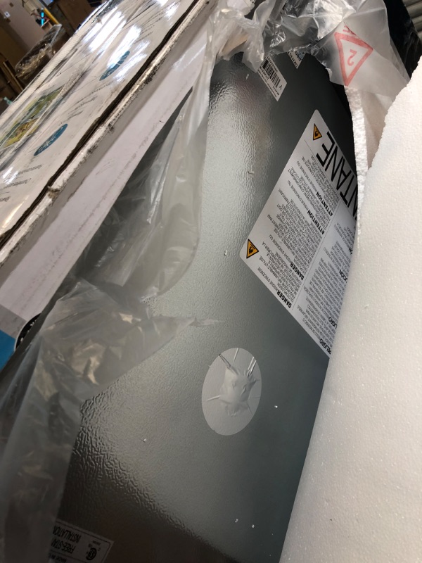 Photo 1 of **USED/HAS DENTS**
Danby Designer DCR031B1WDD 3.1 Cu.Ft. Compact Refrigerator with Freezer, E-Star Rated Mini Fridge for Bedroom, Living Room, Kitchen, or Office, White