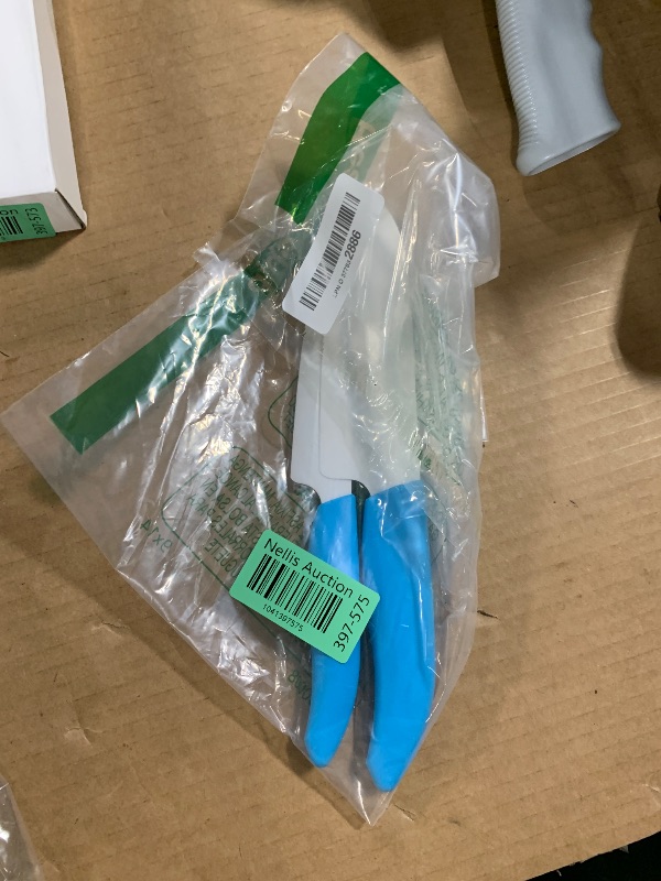 Photo 1 of **TIP TO THE BIGGER KNIFE IS BROKEN** KYOCERA Revolution 2-Piece Ceramic Knife Set: Chef Knife For Your Cooking Needs, 5.5" Santoku and 4.5" Utility Knife, White Blades with Blue Handles, White/Blue