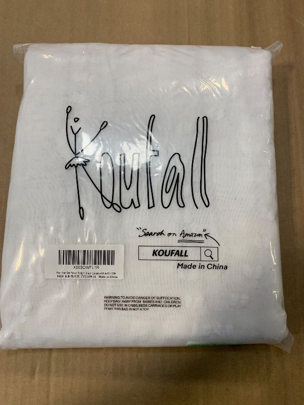Photo 1 of  KOUFALL White Sheer Curtains 108 Inches Long for Living Room 2 Panels Pom Pom Textured Semi Light Filtering Boho Drapes for Bedroom 52x108 Inch Length