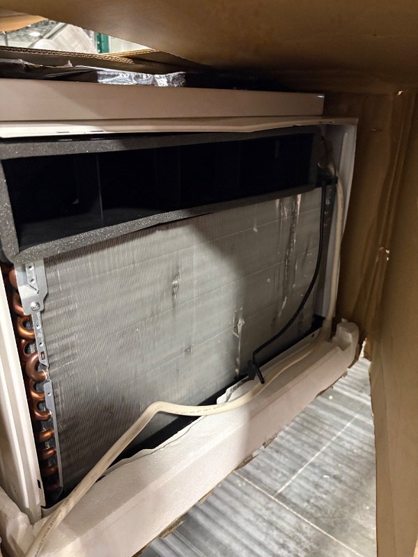 Photo 1 of **damage to coil**
LG LW2524RD 24,500 Window Air Conditioner, 230V, 1,560 Sq.Ft. (39' x 40' Room Size), Quiet Operation, Electronic Control with Remote, 3 Cooling & Fan Speeds, Auto Restart, 24500 BTU, White