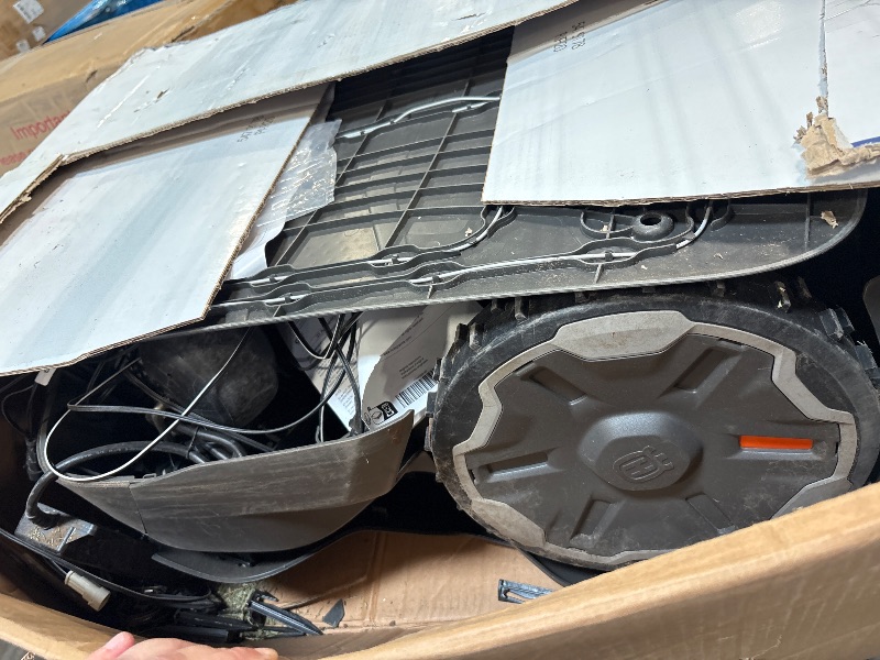 Photo 1 of ***HEAVILY USED-DO NOT KNOW IF IT WORKS***(Husqvarna 420iQ Automower Robotic Mower, 1 Acre Mowing Capacity, Wire Free Robot Lawn Mower with Charging Station, RS1 EPOS Reference Station and Replacement Blades