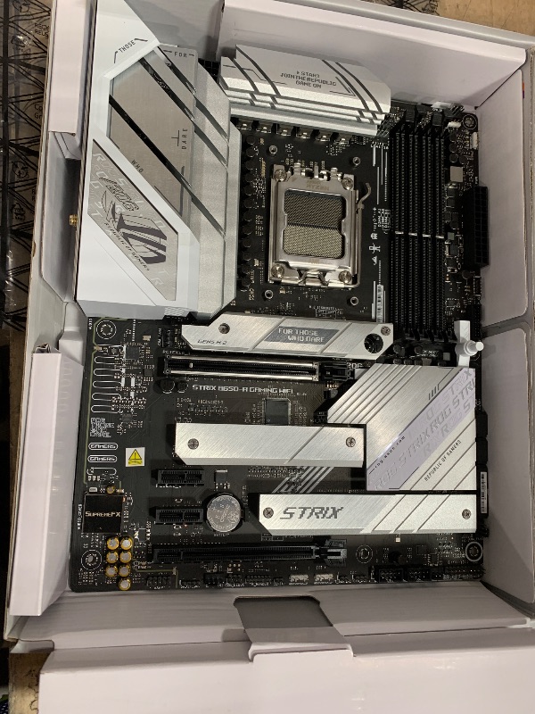 Photo 1 of ***(NO RETURNS OR REFUNDS/ FOR PARTS ONLY/ NON FUNCTIONAL)***
ASUS ROG Strix B650-A Gaming WiFi 6E AM5 (LGA1718) Ryzen 7000 Motherboard(12+2 Power Stages,DDR5,3xM.2 Slots,PCIe® 4.0, 2.5G LAN,WiFi 6E,USB 3.2 Gen 2x2 Type-C® Port)