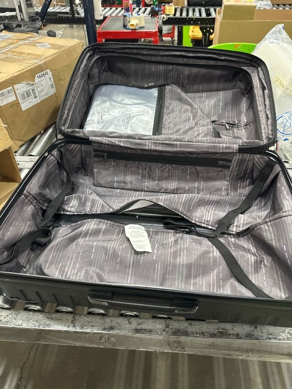 Photo 1 of ***HAS CRACKS AT BOTTOM CORNERS***Black Luggage Hardside Expandable with Double Spinner Wheels, Black, Checked-Large 28-Inch