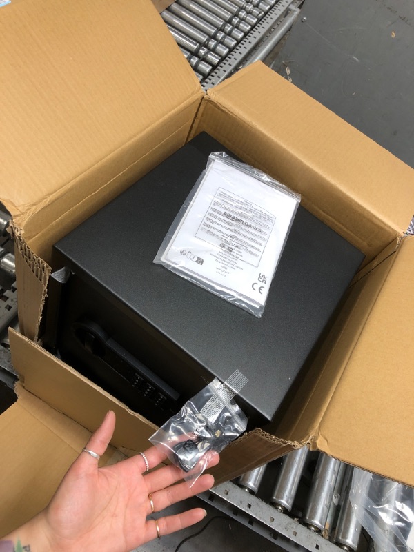 Photo 1 of Amazon Basics Small Safe For Home, Steel Security, Electronic, Programmable Keypad Lock Box, 1.2 Cubic Feet, Black