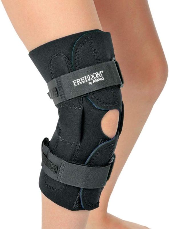 Photo 1 of **MISSING BOTTOM STRAP** AliMed Freedom Pediatric Wraparound Knee Brace, Large