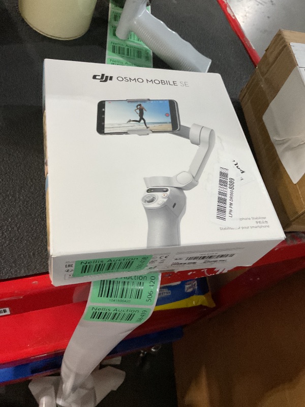 Photo 1 of **APPEARS HEAVILY USED**
DJI Osmo Mobile SE, 3-Axis Phone Gimbal, Portable and Foldable, Gimbal Stabilizer for iphone, Andriod, ShotGuides, ActiveTrack 6.0, Vlogging Stabilizer for Youtube, TikTok, Travel