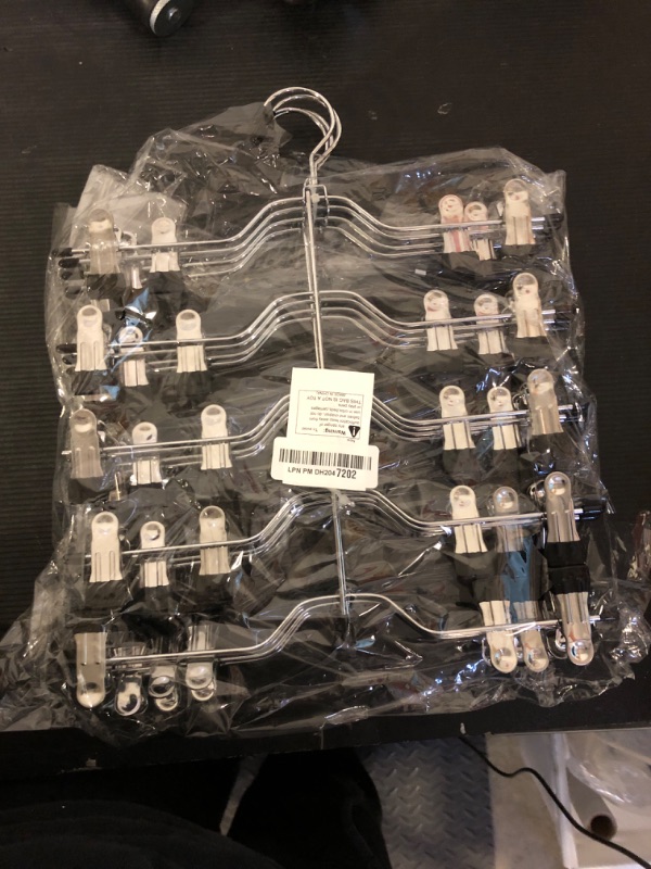 Photo 1 of Besslly Pants Skirt Hangers with Clips, 4 Pack Pants Skirt Hangers Space Saving for Women Closet Organizers
