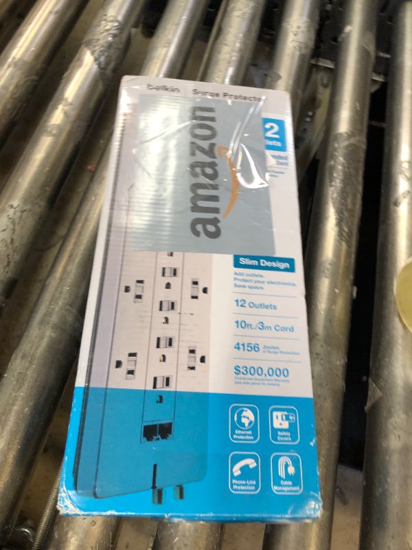Photo 1 of Belkin Power Strip Surge Protector with 12 AC Multiple Outlets, 10 ft Long Flat Plug Heavy Duty Extension Cord for Home, Office, Travel, Computer Desktop, Laptop & Phone Charging Bricks (4,156 Joules)