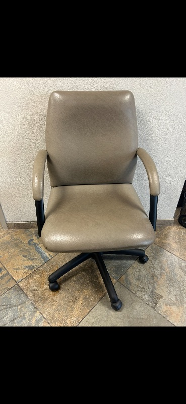 Photo 1 of BEIGE SWIVEL LEATHER OFFICE CHAIR ON CASTERS