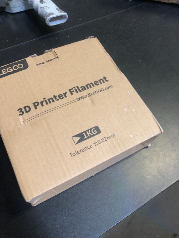 Photo 1 of ELEGOO PLA Filament 1.75mm Black 1KG, 3D Printer Filament Dimensional Accuracy +/- 0.02mm, 1kg Cardboard Spool(2.2lbs) 3D Printing Filament Fits for Most FDM 3D Printers