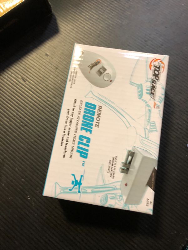 Photo 1 of Top Race Drone Clip Remote Control Object Launcher - Release and Drop Drones Delivery (180 Feet) - Drone Drop Release