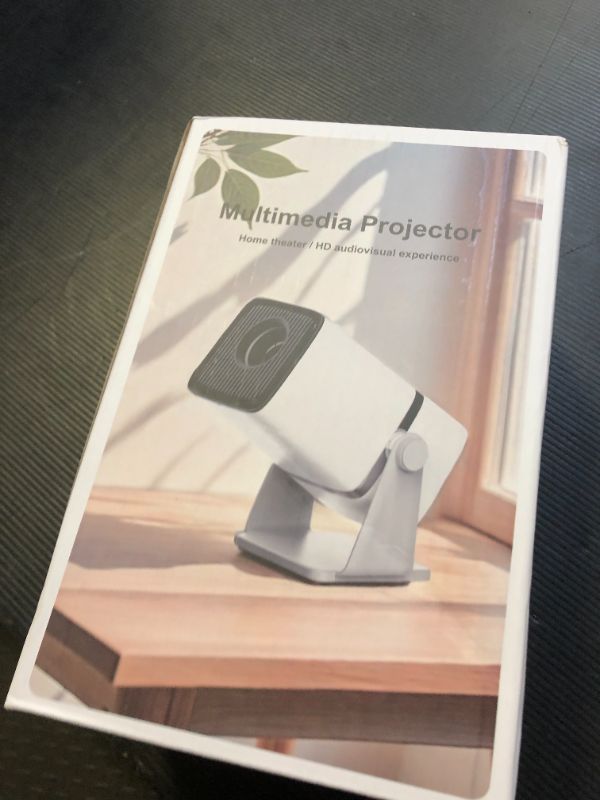 Photo 1 of Mini Projector with WiFi and Bluetooth, Native 1080P, 180° Rotation Stand Smart Projector, 150" Portable Projector with Android TV 13, 2.4G/5G, 300 ANSI Auto Keyston Outdoor/Home Movie,White