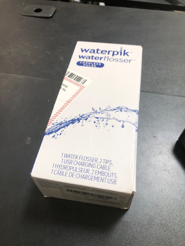 Photo 1 of Waterpik Cordless Pulse Rechargeable Portable Water Flosser for Teeth, Gums, Braces Care and Travel with 2 Flossing Tips, Waterproof, ADA Accepted, WF-20 White, Packaging May Vary