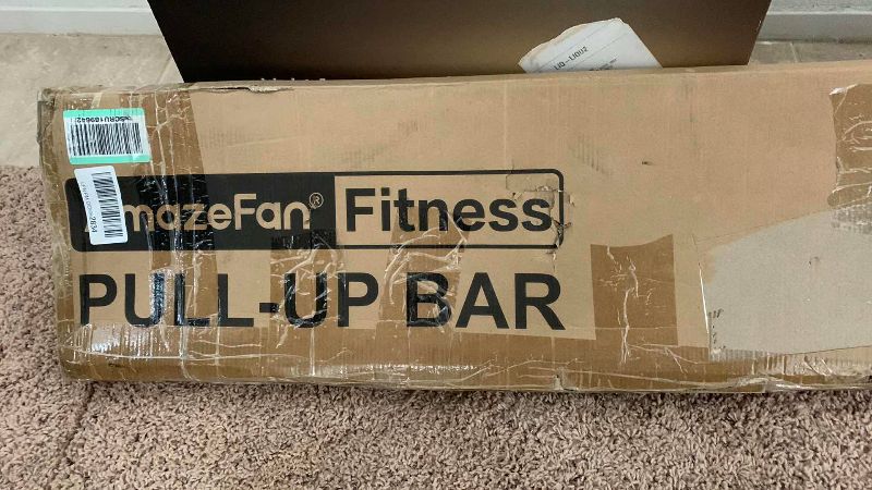 Photo 1 of CURL BAR AND DUMBBELL WITH METAL WEIGHTS AND A PULL UP BAR