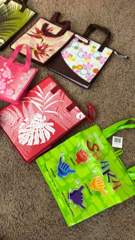 Photo 1 of ASSORTED HAWAIIAN THEMED BAGS