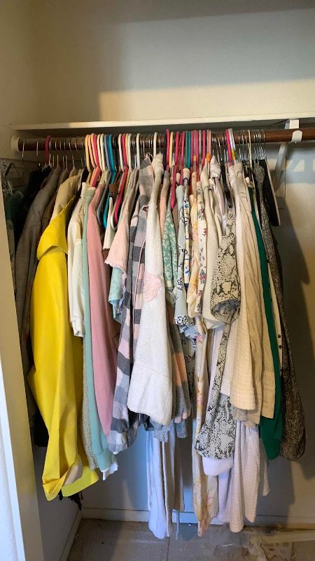 Photo 1 of CONTENTS OF CLOSET WOMANS CLOTHING SIZE M-XL