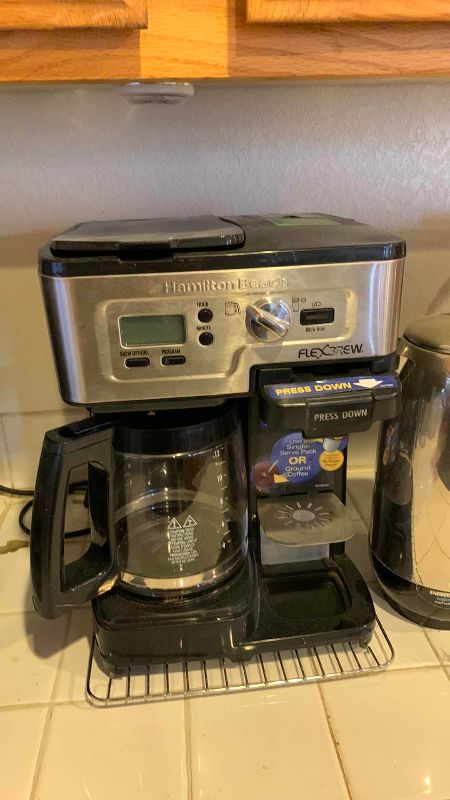 Photo 1 of 2 COFFEE MAKING MACHINES AND A COFFEE POT