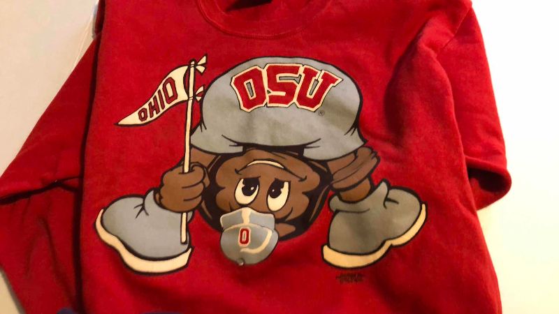 Photo 1 of VINTAGE OHIO STATE FOOTBALL SWEATSHIRT SIZE L AND A CLEVELAND SWEATSHIRT