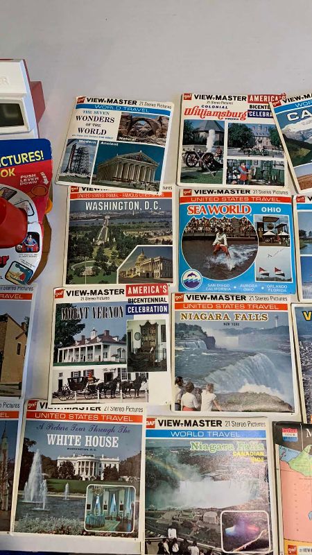 Photo 1 of 2 VINTAGE VIEW-MASTER 3-D VIEWERS AND 22 PACKETS OF REELS