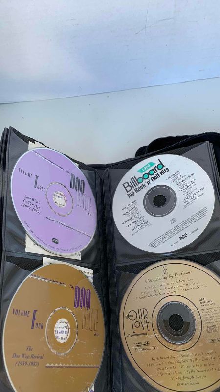 Photo 1 of 2 CASES OF ROCK AND ROLL AND COUNTRY CLASSICS CD’S