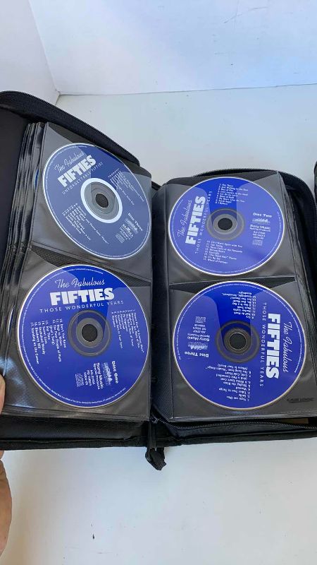 Photo 1 of 2 CASES OF ROCK AND ROLL AND COUNTRY CLASSICS CD’S