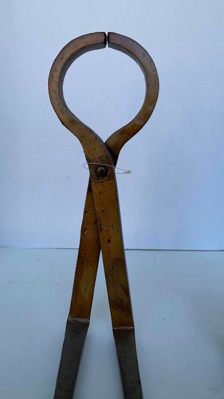 Photo 1 of 2 METAL SITTING FIGURES 21”