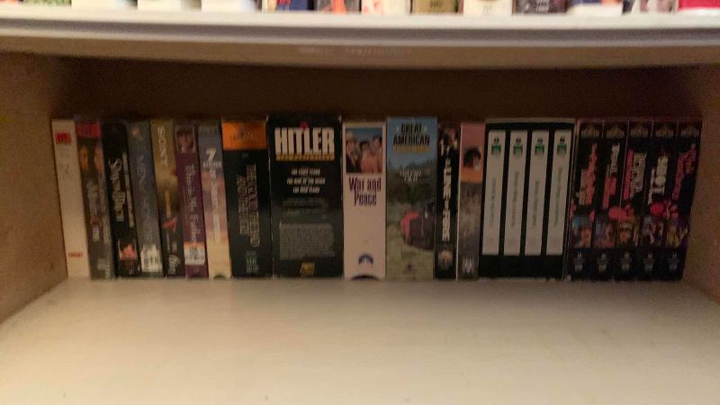 Photo 1 of SHELF OF VHS TAPES