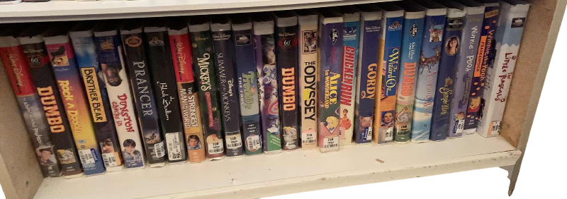 Photo 1 of SHELF OF VHS TAPES