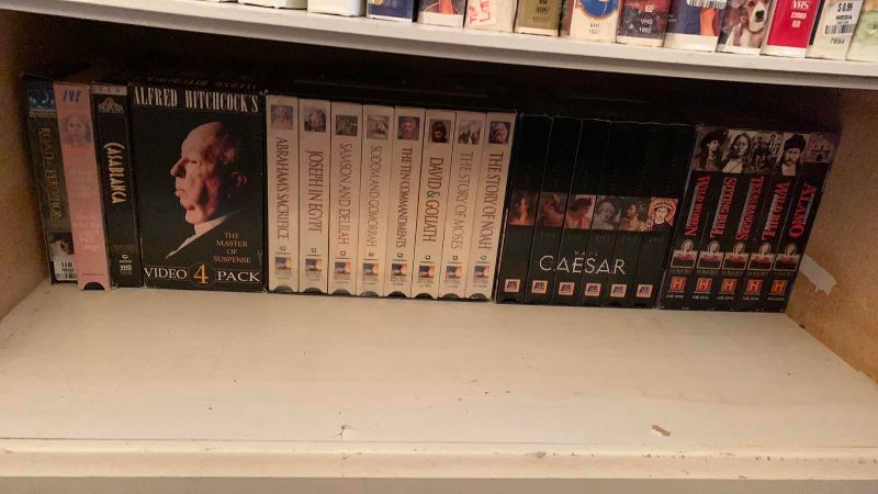 Photo 1 of SHELF OF VHS TAPES