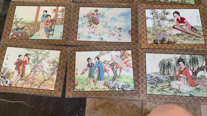 Photo 1 of NINE CHINESE DOUBLE SIDED PLACEMATS 16” X 12”