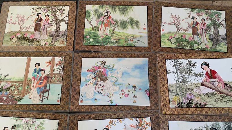Photo 1 of NINE CHINESE DOUBLE SIDED PLACEMATS 16” X 12”