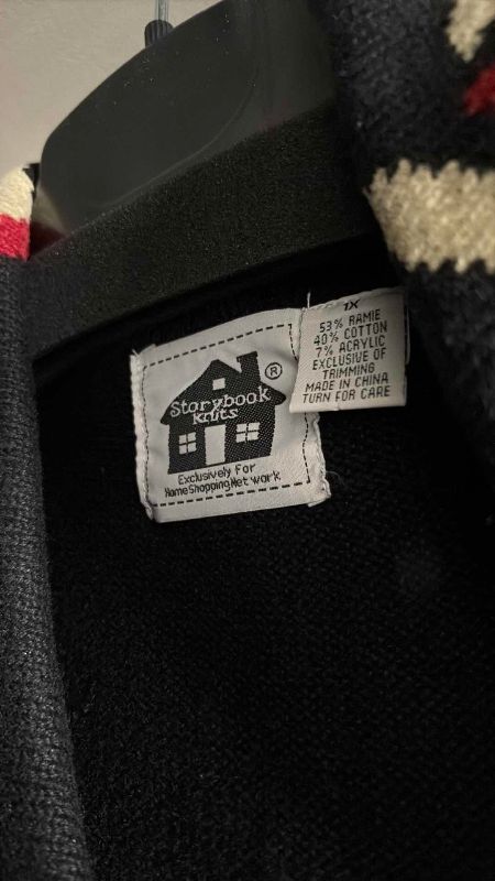 Photo 1 of CONTENTS OF GUEST ROOM CLOSET WOMENS CLOTHING XL-2XL