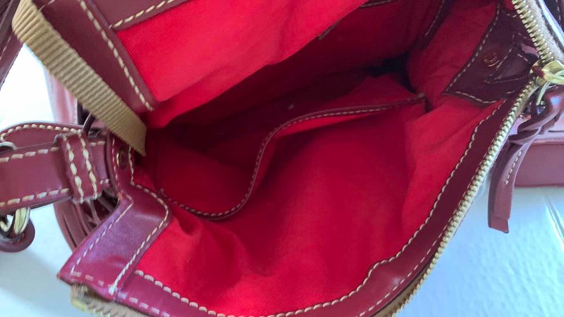 Photo 1 of DOONEY AND BOURKE HANDBAG AND COIN PURSE