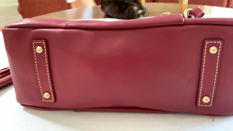 Photo 1 of DOONEY AND BOURKE HANDBAG AND COIN PURSE