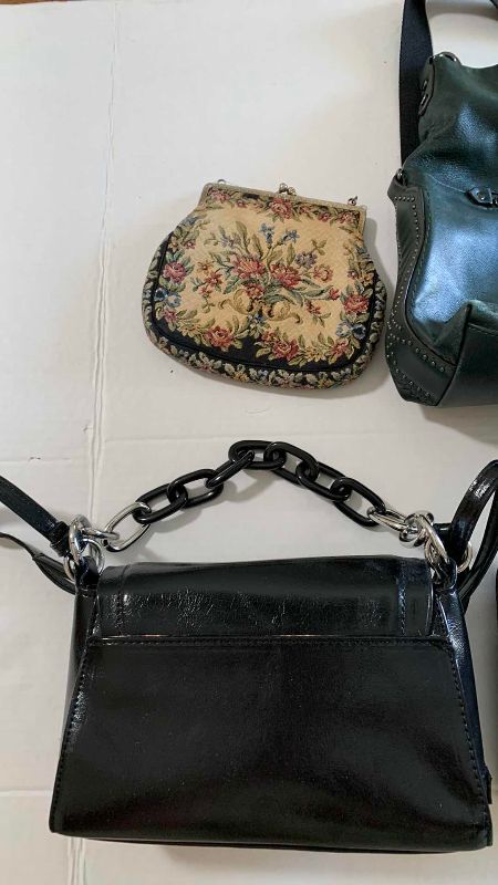 Photo 1 of FOUR HANDBAGS