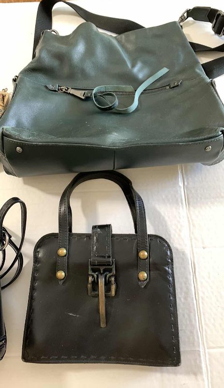 Photo 1 of FOUR HANDBAGS