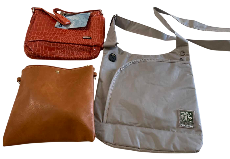 Photo 1 of THREE TRAVEL HANDBAGS
