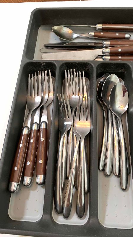 Photo 1 of TWO SETS OF CUTLERY
