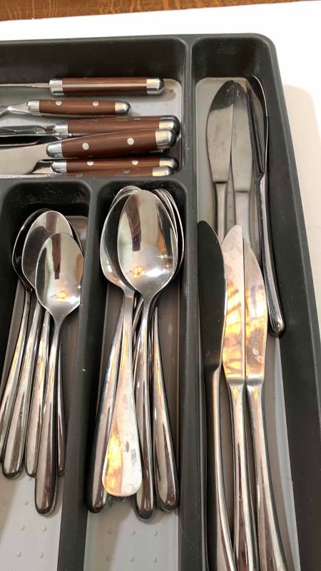 Photo 1 of TWO SETS OF CUTLERY