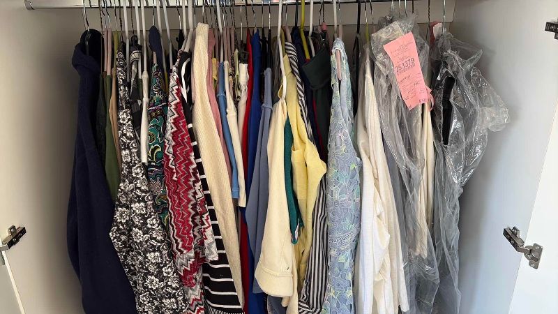 Photo 1 of CONTENTS OF GARAGE STORAGE WOMENS CLOTHING SHIRTS Xl-2XL