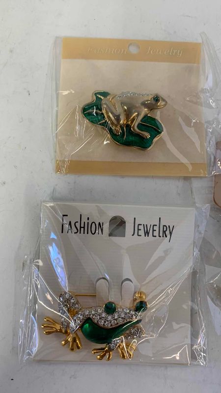 View 2 of THREE PIECES OF FROG JEWELRY