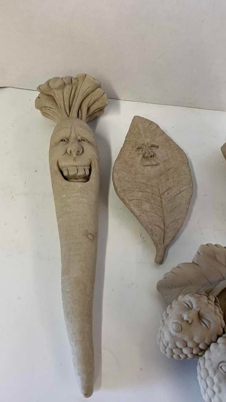 View 2 of FOUR STONE PIECES OF GARDEN DECOR TALLEST IS 13”