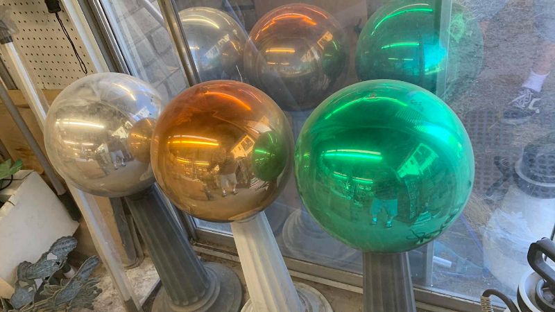 View 2 of THREE PLASTIC GLOBES ON PILLARS 31”