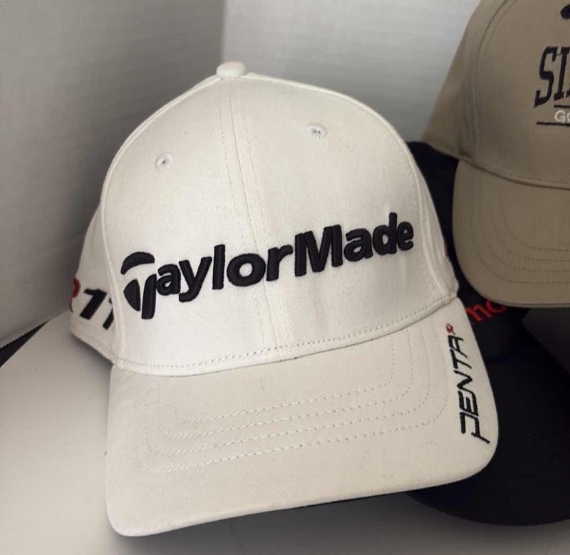 Photo 1 of MENS CAPS: NIKE, TAYLOR MADE, AND GOLF COURSES