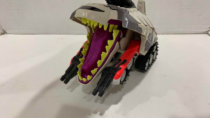 Photo 1 of VINTAGE MATTEL 1993 ATTACK PACK STEGOSAURUS TOY