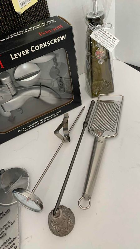 Photo 1 of HOME GOODS: WINE BOTTLE OPENERS, PLACE MATS, AND SERVING ITEMS
