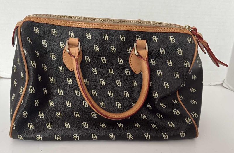 Photo 1 of DOONEY & BOURKE BLACK AND BROWN SATCHEL 12”X12”