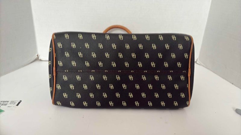 Photo 1 of DOONEY & BOURKE BLACK AND BROWN SATCHEL 12”X12”