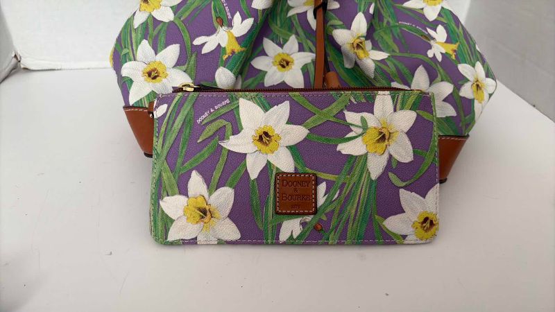 Photo 1 of DOONEY & BOURKE PURPLE DAFFODIL DRAWSTRING BUCKET BAG 12”X12” AND WRISTLET 9” X 4”